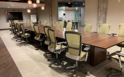 Picture of a conference room with a conference table and chairs.