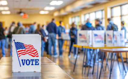Polling place with crowd of people lined up to vote.
