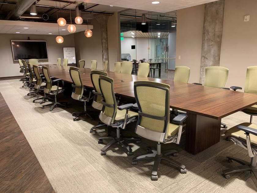 Picture of a conference room with a conference table and chairs.