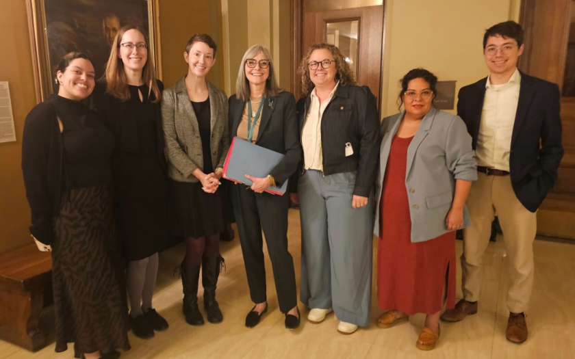 Group of MCF staff and partners pose together at the Minnesota House